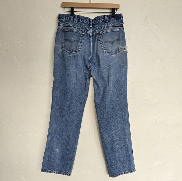 Vintage Levi's 557 Cowboy Distressed Jeans